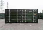 Grüner Container mit einer offenen Seite, 20 Fuß